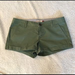 New green cuffed shorts